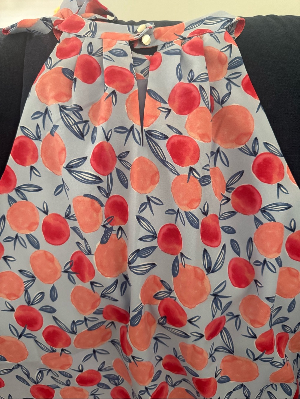 Light blue sleeveless top